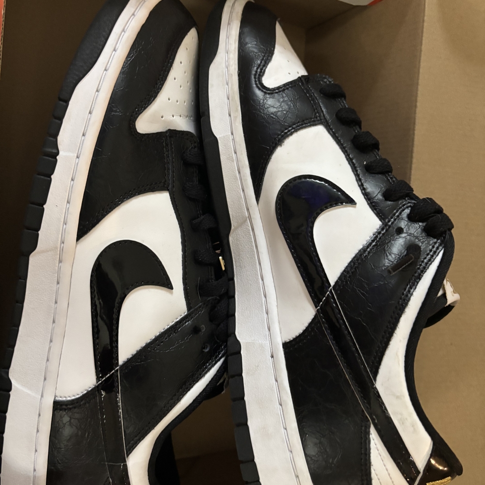 Nike Black and White Sneakers with Gold Accents - Picture 5 of 5